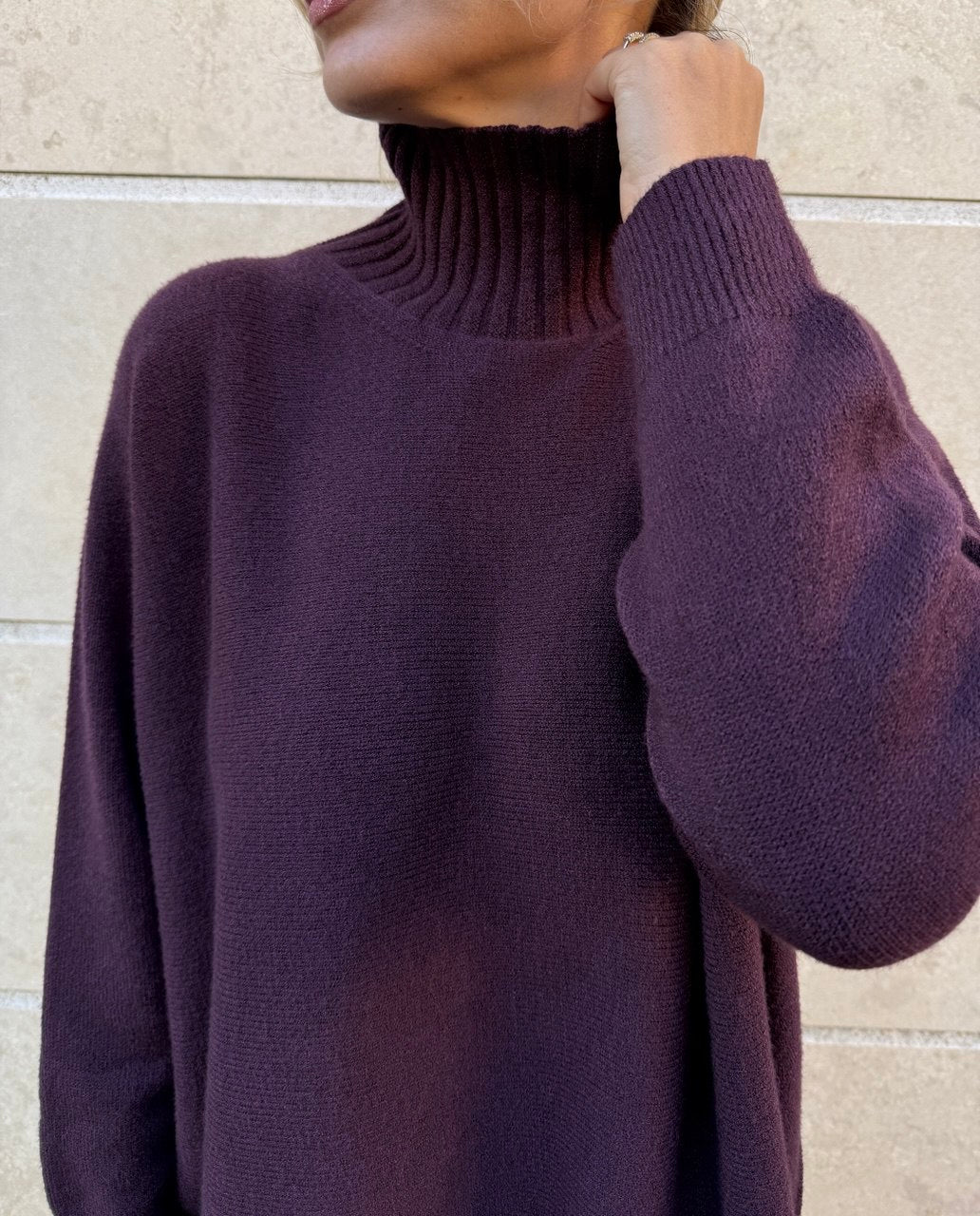 Pullover a dolcevita oversize.